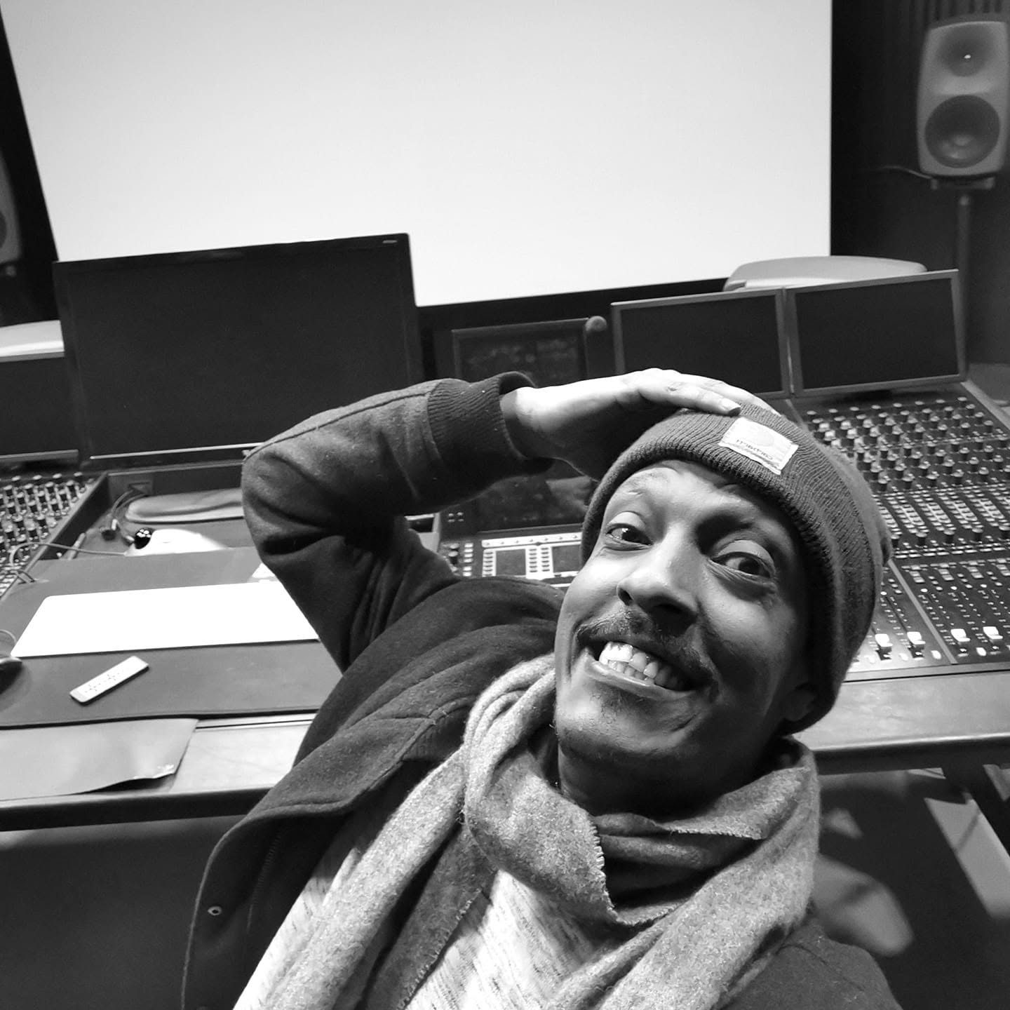 Portrait at a studio mixing console