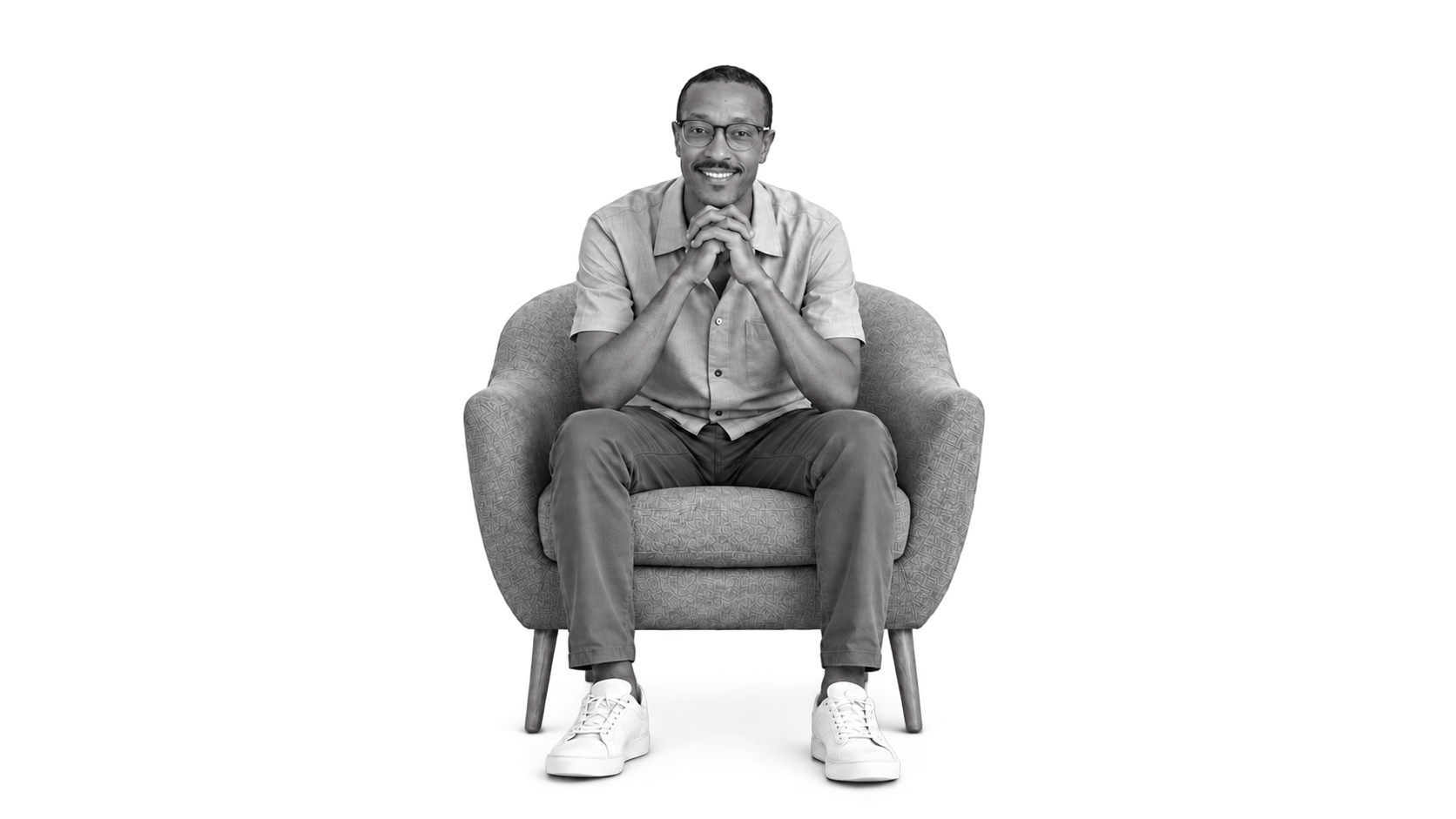 Salah seated in an armchair